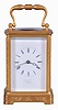 France, for Hall and Co., Manchester, an engraved carriage timepiece for the English market, the glazed, gilt Corniche case with foliate ornament, Roman numeral white enamel dial, blued steel Breguet style hands, 8 day movement with lever platform, the back plate marked "B" within a circle