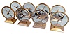 Clocks- 8 (Eight) Jefferson Electric Company, Bellwood, Illinois, "Golden Hour" electric mystery clock with hands suspended in clear glass dial in gold plated cases with classic mid-century modern design.