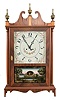 Elmer O. Stennes, Weymouth, Mass., 8 day, time and strike, spring brass movement pillar & scroll shelf clock. Case is stamped "36", "75".