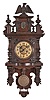 Germany, "Berliner' open well wall clock, 8 day, time and strike, spring driven movement in a walnut case with brass dial and matching embossed dial center and pendulum bob