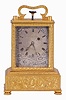 Adolph Uligh, Vienna, quarter repeating miniature carriage clock, rectilinear, gilt brass case on turned feet, the front and sides with foliate engraving, Roman numeral silvered dial, also engraved with floral decoration, blued steel Breguet style hands, round, 30 hour verge fusee movement with blued steel gongs, repeating the last hour and quarter on demand
