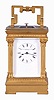 L. Tissot and Cie., Switzerland, for Chester Billings & Son, New York, miniature hour repeating carriage clock, the gilt, glazed Anglaise Riche style case in mignonette #3 size, Roman numeral white enamel dial, blued steel hands, gilt 8 day movement with lever platform and cut bimetallic balance, repeating the hours on demand, with Tissot logo at lower left, back plate, serial #54093