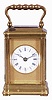 Breguet, Paris, a 3/4 size striking carriage clock, glazed brass Gorge case, white enamel dial with blue Roman numerals on a gray ground, with gold, Arabic numeral, outer five minute markers, blued steel Breguet style hands, and with engine turned, gilt mask, the top glass also backed with a matching, engine turned plate with oval aperture for viewing the escapement, 8 day, two train movement with lever platform and cut bimetallic balance, striking the hour and half hour on a bell, serial #1316
