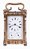 Austria, an unusual three train carriage clock with Viennese striking, date, and alarm, gilt case with corbelled pilasters, top and base with cupids bow molded edges, case back with shuttered apertures for winding and setting, Roman numeral white enamel dial with date and alarm chapters, blued steel trefoil hands, 30 hour time, strike, and alarm movement with cylinder platform, grand sonnerie striking, and repeating the last hour and quarter on demand