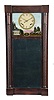 Joseph Ives, New York, 8 day, time and strike, weight brass and iron plate movement mirror clock.