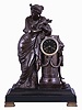 France, extra large patinated spelter figural clock, depicting a tall woman in classic Greek gown, (figure is 25"), standing beside a fluted pedestal with footed accents, and with a good bell strike movement.