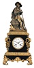 France, a bronze and black slate figural mantel clock, the stone case with canted corners, and replete with gilt masks and naturalistic ornament, surmounted by a figure of a hunter in a rustic landscape, Roman numeral white enamel dial, blued steel hands, and 8 day, time and strike pendule de Paris movement with silk thread suspension, signed "Gonin Aine"