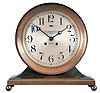 Chelsea Clock Co., Boston, Mass., "Base and Ball" ship's clock, 8 day, time and strike, spring driven jeweled movement in a heavy brass case with hinged bezel on ball feet, 8.5 inch silvered dial. Serial number 76456.