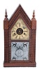 Forestville Mfg. Co., J. C. Brown, Bristol, Conn. miniature steeple shelf clock with a spring driven 30 hour time and strike movement in a rosewood ripple front case.