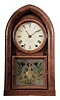E. C. Brewster, Bristol, Conn., Round Gothic shelf clock with a spring driven, 8 day time and rack strike fusee movement in a mahogany veneered case.