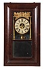 Joseph Ives, Plainville, Conn., 8 day, time and strike, weight brass movement O.G, gilt columns and gilt leaf crest shelf clock. This case has the earlier version of the movement as it has a partial cast iron backplate. The later version made by Hills, Goodrich & Co had full cast iron backplate.