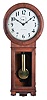 Seth Thomas Clock Co., Thomaston, Conn., "Regulator No. 2" wall clock, oak, with turned bezel over the painted zinc arabic numeral dial marked "Seth Thomas" and "Made in the United States of America", the lower glazed door unlocks with the winding key, pendulum, beat scale, cylindrical brass weight and remnants of original printed label in the base, eight day brass time only movement with dead beat escapement, maintaining power and lantern pinions all mounted to an iron frame attached to the backboard.
