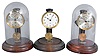 Clocks- 3 (Three) Poole: Poole Mfg. Co., Ithaca, NY, "Executive", electro-mechanical battery-driven mantel timepieces serial numbers1343, 2426, 3676. All with wood bases, two with silvered dials and one with white enamel dial.