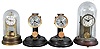 Clocks- 4 (Four) Electro-mechanical: two Poole Mfg. Co., New York, "Executive", electro-mechanical battery-driven mantel timepieces, both with bakelite cases and silvered dials; Barr electro-mechanical battery-driven mantel timepiece with wood base and silvered dial; Tiffany "Neverwind" electro-mechanical timepiece.
