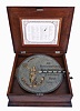 Germany, Polyphon Musikwerk, 39.8cm or 15 1/2 inch disc playing music box, style 43 variant [single comb with going barrel movement [not a coil spring], in a nicely figured mahogany case, plain, with raised molding to lid, and an insert inside lid showing available tunes. With 7 Polyphon discs, including the Star Spangled Banner (Das sternfunkelnde Banner) Note this box will play Regina 15 1/2 inch discs also, see separate lot of 125 Regina discs.