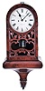 Bevan and Weare, Birkenhead, a small, mid 19th century hanging regulator, the mahogany arch top case with glazed door containing a carved fret, base with deeply molded bottom bracket and carved drop, Roman numeral silvered dial, blued steel spade and poker hands, 8 day, time and strike fusee movement with shouldered plates, recoil escapement, and half seconds beating mercury pendulum, striking on a gong