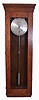 Jeweler's hanging regulator 8 day, time only, weight driven movement in period early 20th century oak case with movement built by Arthur Dekalb of Pulaski, NY and designed by the late E.H. Parkhurst, Lancaster, PA (Past President of NAWCC) in 1972
