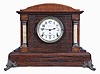 Seth Thomas Clock Co., Thomaston, Conn., "Chime Clock No. 4" shelf clock with a spring driven, 8 day time and 4 Bell Sonora strike movement in a rosewood adamantine finish.
