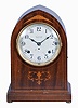 Seth Thomas Clock Co., Thomaston, Conn., "Chime Clock No. 64" shelf clock with a spring driven, 8 day time and 5 Bell Sonora strike movement in a mahogany case with decorative inlay.