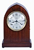 Seth Thomas Clock Co., Thomaston, Conn., "Chime Clock No. 214" shelf clock with a spring driven, 8 day time and 8 Bell Sonora strike movement in a mahogany case. This clock will play Whittington or Westminster chimes.