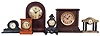Clocks- 10 (Ten) Mantel and Desk: Clocks include four black mantel clocks by Sessions, Waterbury, and Seth Thomas; flat and round top time and strike mantel clocks by Sessions and Gilbert; three metal and one wood case time only desk clocks.