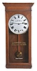 Differential Power Clock Co., Chicago, "Year Running" wall clock with unique patented double spring movement in a robust oak case, and with original front tablet identifying the clock.