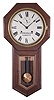 Seth Thomas Clock Co., Thomaston, Conn., "World" long drop octagon model, in walnut and with double spring 15 day timepiece movement.