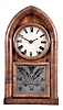 Brewster & Ingrahams, Bristol, Conn., BEEHIVE shelf clock, 8 day spring, time and gong strike, in a mahogany veneered case.