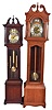Tall Clocks- 4 (Four) modern: 8 day, weight driven, time, strike and chime including a Howard Miller and a New England Clock Co.