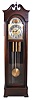The Colonial Mfr. Co., Zeeland, Mich., tall case clock, 8 day, time, strike and five tubular chime, three brass weight driven movement in a mahogany case with a brass dial with silvered chapter ring, seconds bit and moon phase