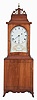 Joseph Sterling, Boston, Massachusetts, cherry cased kidney dial shelf clock, with molded top, central inlaid plinth and pierced fret, glazed kidney dial opening surmounts the line and alternating dark and light inlaid base, with scalloped apron and French feet, eight day time only brass movement with lead weight, brass-faced pendulum and iron rod.