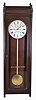 E. Howard & Co., Boston, Mass., "Regulator No. 89", wall clock, 8 day, time only weight driven movement in a oak case with 12 inch, Roman numeral painted dial