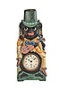 Lorenz Furtwangler & Sohne a "Minstrel" moving eye novelty clock, the front cast in the form of an early 20th century stereotype of the strumming, drinking African- American, his clothing brightly painted, and his large, glass eyes, connected to the pallet arbor, moving to and fro as the clock runs, signed, Arabic numeral celluloid dial, blued steel spade hands, thirty hour timepiece movement