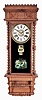 Wm. L. Gilbert Clock Co., Winsted, Conn., "Berkshire" model, uncommon calendar clock with the calendar mechanism mounted to the door.