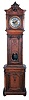 Germany or Austria, standing Viennese regulator, 8 day, time and grand sonnerie strike, three brass weight driven movement in a carved walnut two piece case with engraved silvered dial and engraved pendulum bob