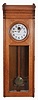 Standard Electric Time Co., Springfield, Mass., "Master Clock" wall clock, electrically driven, time only movement producing electrical impulse to drive a slave or slaves, one of which is included. The clock is housed in a heavy oak case and has painted metal dial.