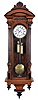 Clocks- 2 (Two) Vienna regulators: (1) Remember GR, Wien, 8 day, time and strike, weight driven movement in a walnut case with ebonized accents; (2) Unsigned movement, 8 day, time and strike with quarter strike, weight driven movement in a walnut case.