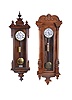 Clocks- 2 (Two) Vienna Regulator, 8 day, weight driven, time only movements: (1) K-K Privilegium, Franz Drexler, mahogany with matching embossed weight and pendulum bob; (2) Unsigned, walnut case