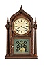 Forestville Mfg. Co., J. C. Brown, Bristol, Conn., 8 day, time and strike, spring brass movement four column round gothic or onion top ripple molding shelf clock.