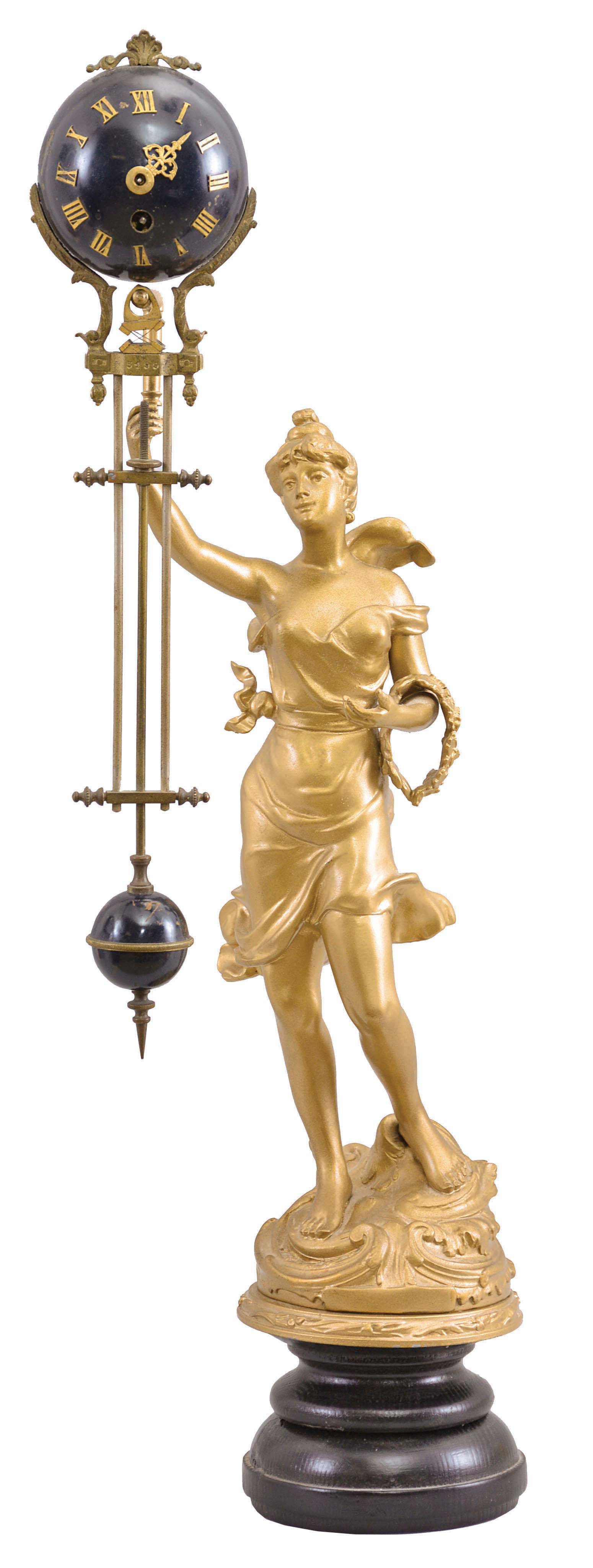 France, swinging mystery clock, 8 day, time only, spring-driven movement in blue painted hemisphere, the lower portion in gridiron style, ending with a smaller blue sphere, held aloft by a figure of a young woman in a flowing dress standing on a cast base which is mounted on a turned wood base. — Antique Clocks Price Guide