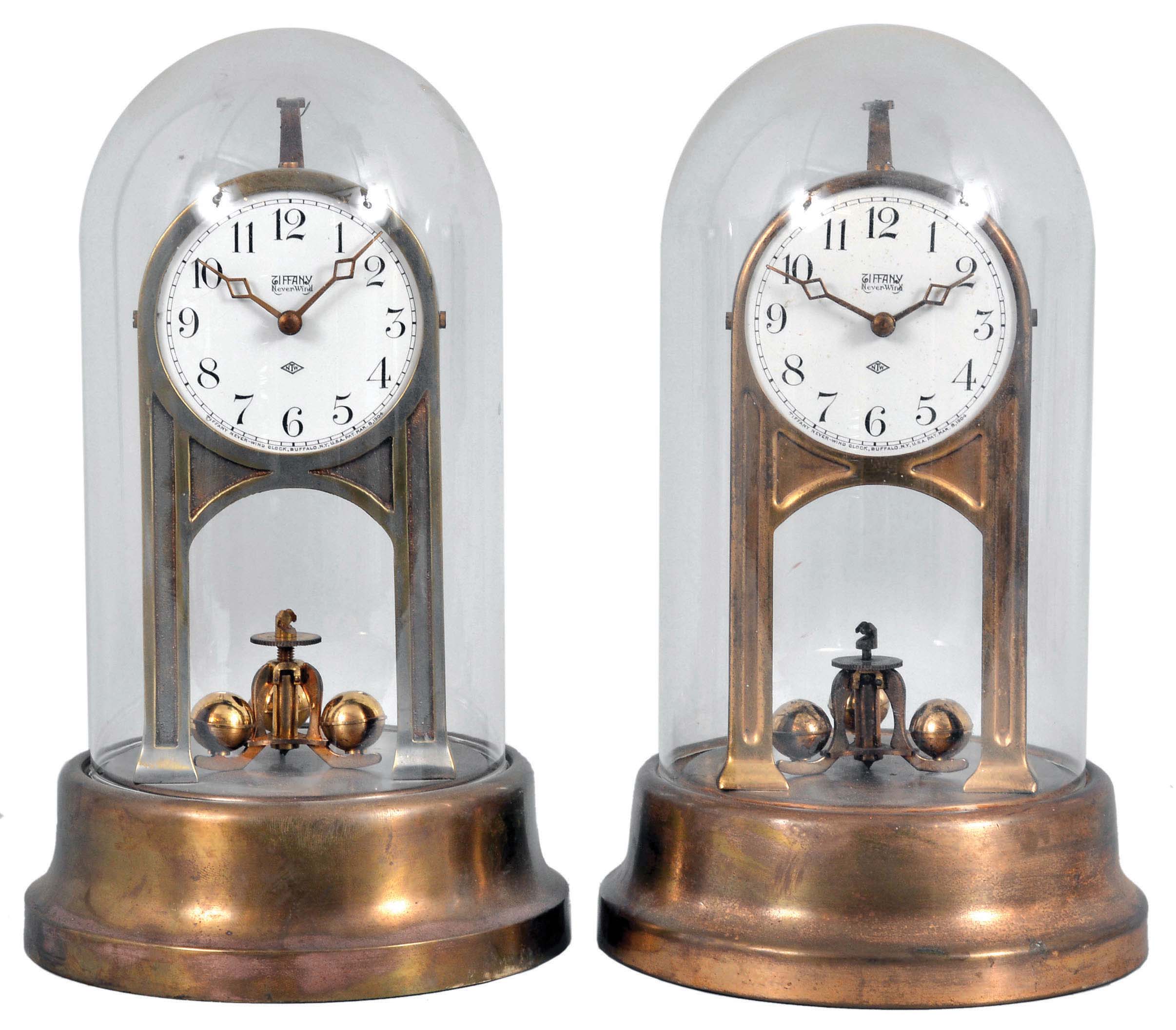 Clocks- 6 (Six) Electro-mechanical: (1) Poole Mfg Co., Ithaca, New York "Executive" battery-powered desk clock with molded bakelite base and glass dome; (2) Poole Mfg Co., Ithaca, New York, round top battery-powered mantel clock in a mahogaNew York case with string inlay; (3) Barr Mfg. Corp., Weedsport, New York, battery-powered mantel clock; (4) and (5) TiffaNew York Neverwind Clock, Buffalo, New York, "Neverwind" electric torsion pendulum clocks; (6) TiffaNew York Electric Mfg. Co., New York, "TiffaNew York Electric" larger battery powered clock with torsion pendulum. — Antique Clocks Price Guide