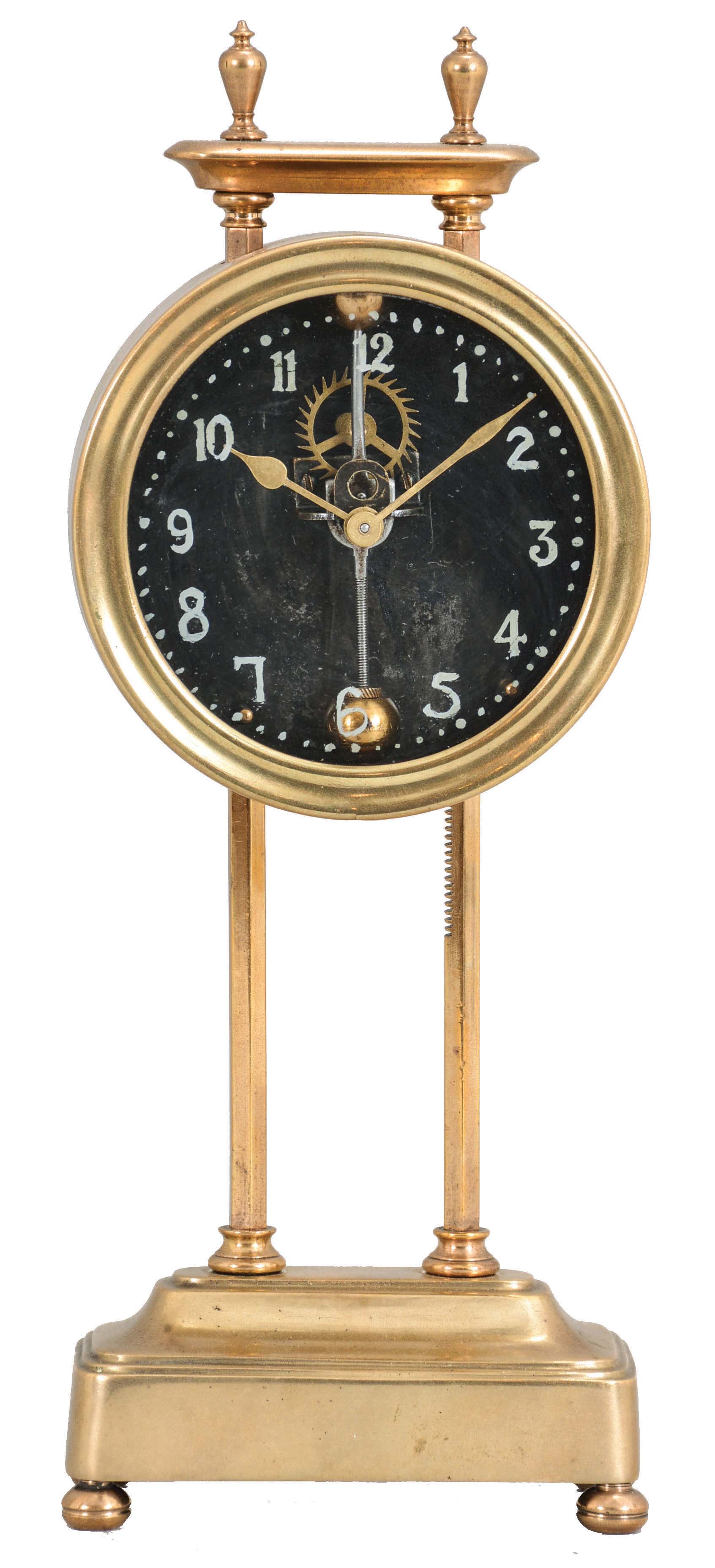 England, gravity clock, 30 hour, time only, weight driven movement with a visible escapement and compound pendulum on a molded brass base with rack gear integrated into upright pillars, white hands and numerals back painted on glass. — Antique Clocks Price Guide