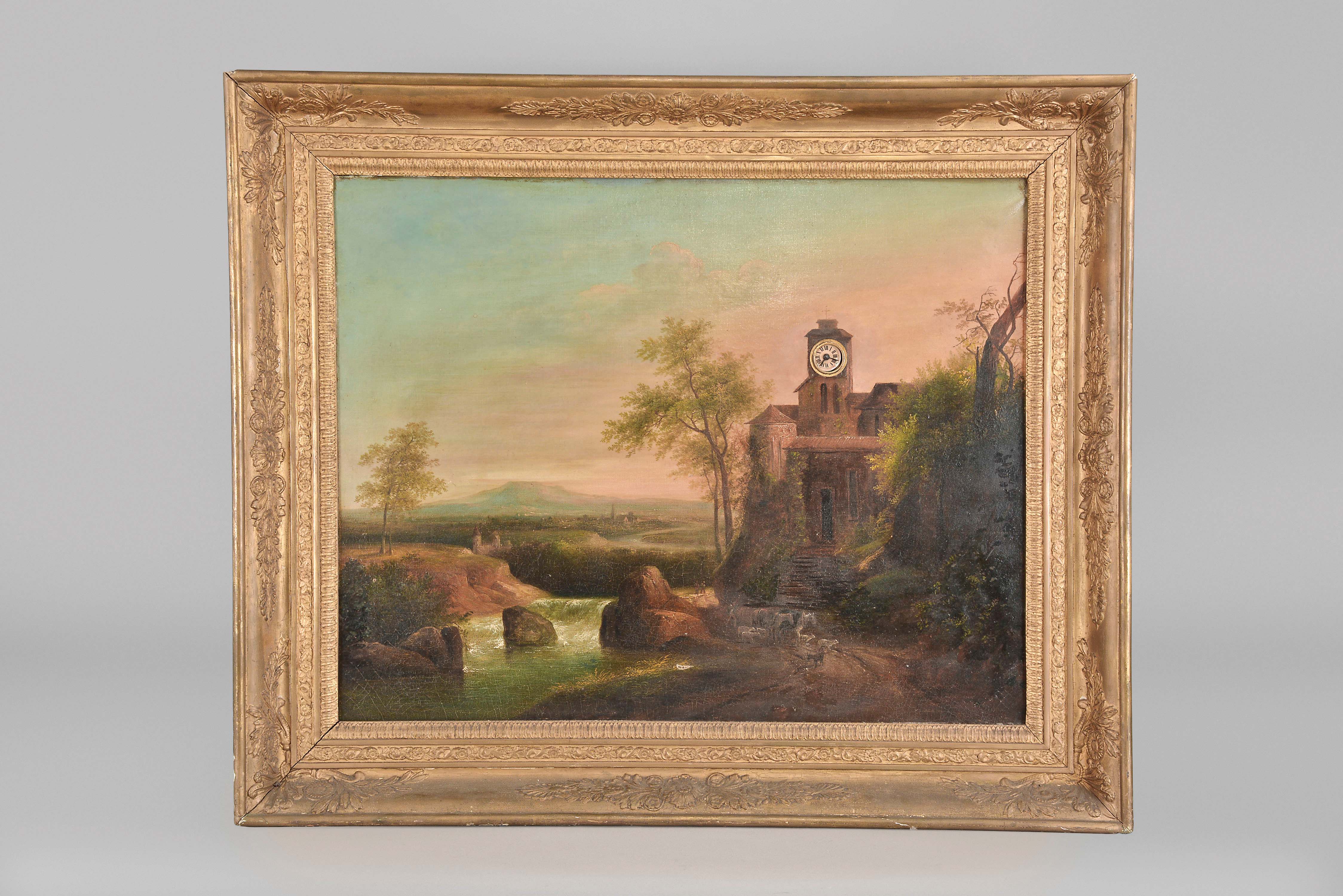 France, a large, 19th century musical picture clock, the canvas with rural landscape, foreground with rushing river, and shepherd with sheep, horses, and goats, all before a castle with clock tower, the background with village and distant mountains, the stretcher signed and with identification of view, contained within a deeply molded gilt frame with composition ornament, the two tune music box and 8 day, two train clock movement concealed behind the painting, musical selections are Yankee Doodle, and one other unidentified air, the clock movement with silk thread suspension signed "Robert a Paris" — Antique Clocks Price Guide
