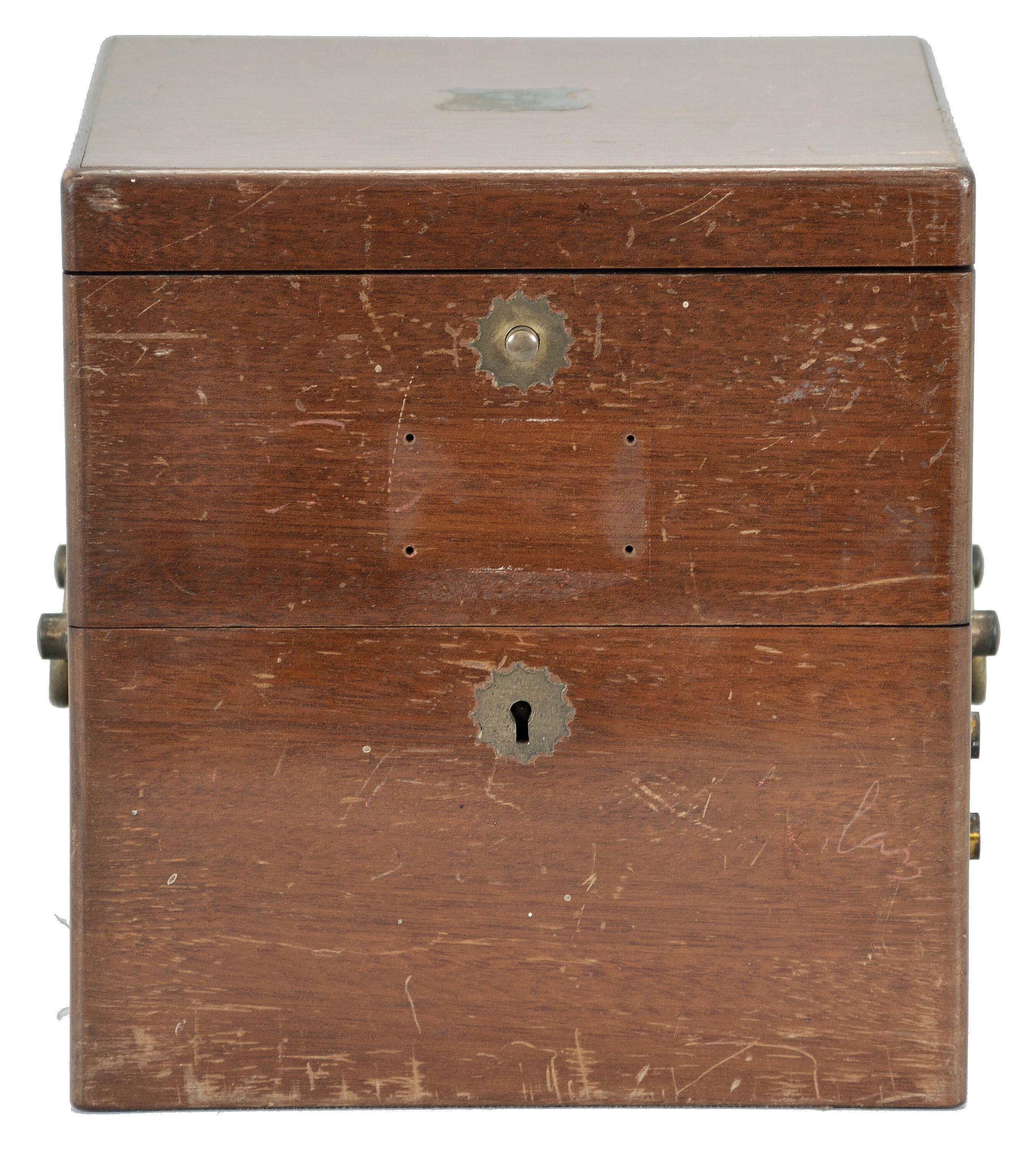 John Bliss &amp; Co., New York, two day marine chronometer, 11 jewel fusee movement with spotted plates, Earnshaw's escapement, freesprung, cut bimetallic balance, diamond endstone, and blued steel helical balance spring, Roman numeral silvered dial with wind indicator and gold spade and poker hands, with gimballed, lacquered brass bowl, and contained in a later, three tier mahogany box with brass furniture, serial #3048 — Antique Clocks Price Guide