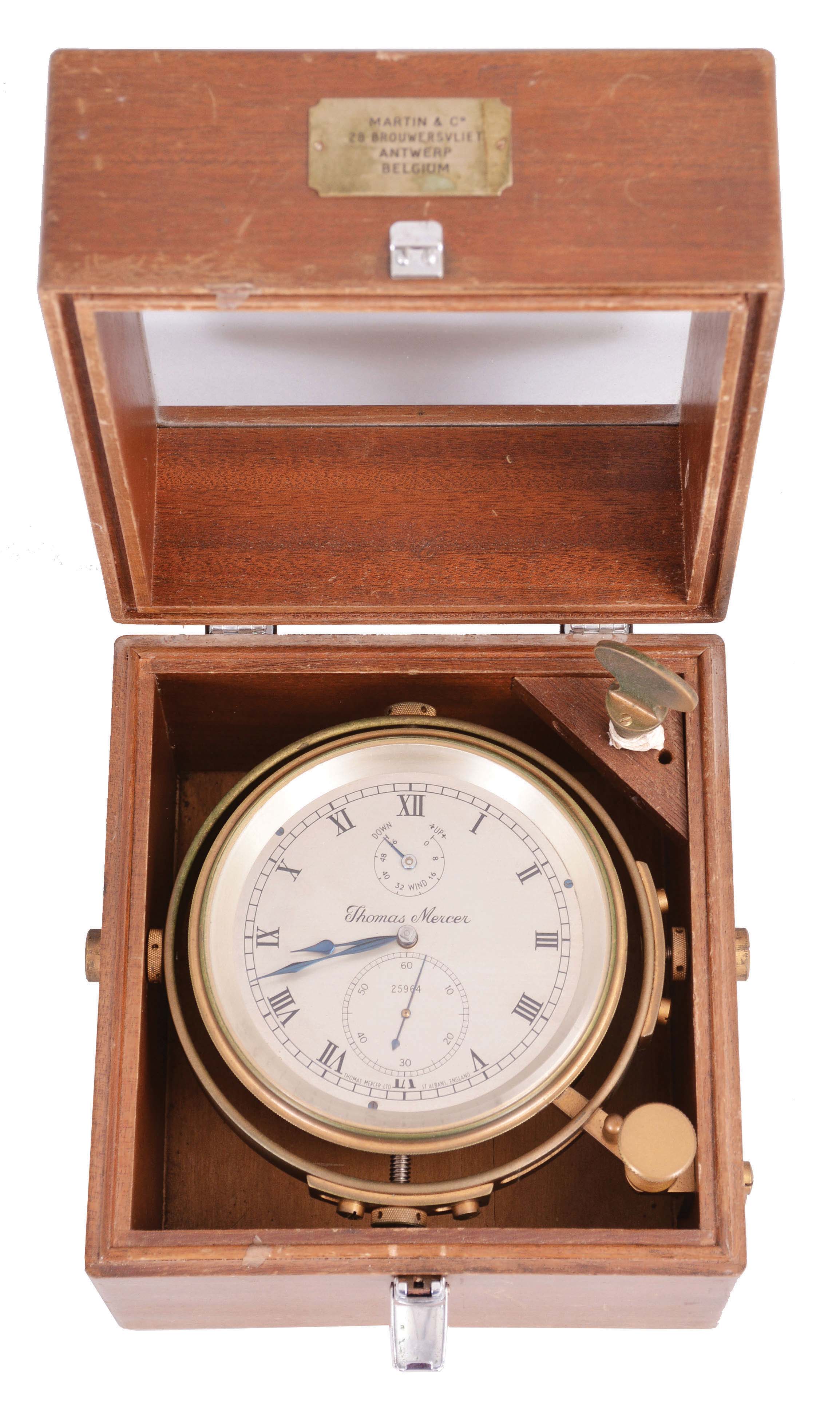 Thomas Mercer, St. Albans, two day marine chronometer, 13 jewel fusee movement with spotted plates, Earnshaw's escapement, and freesprung cut bimetallic balance with helical balance spring, Roman numeral silvered dial with wind indicator and blued steel spade and poker hands, with gimballed brass bowl, contained in a two tier mahogany box, serial #25964 — Antique Clocks Price Guide