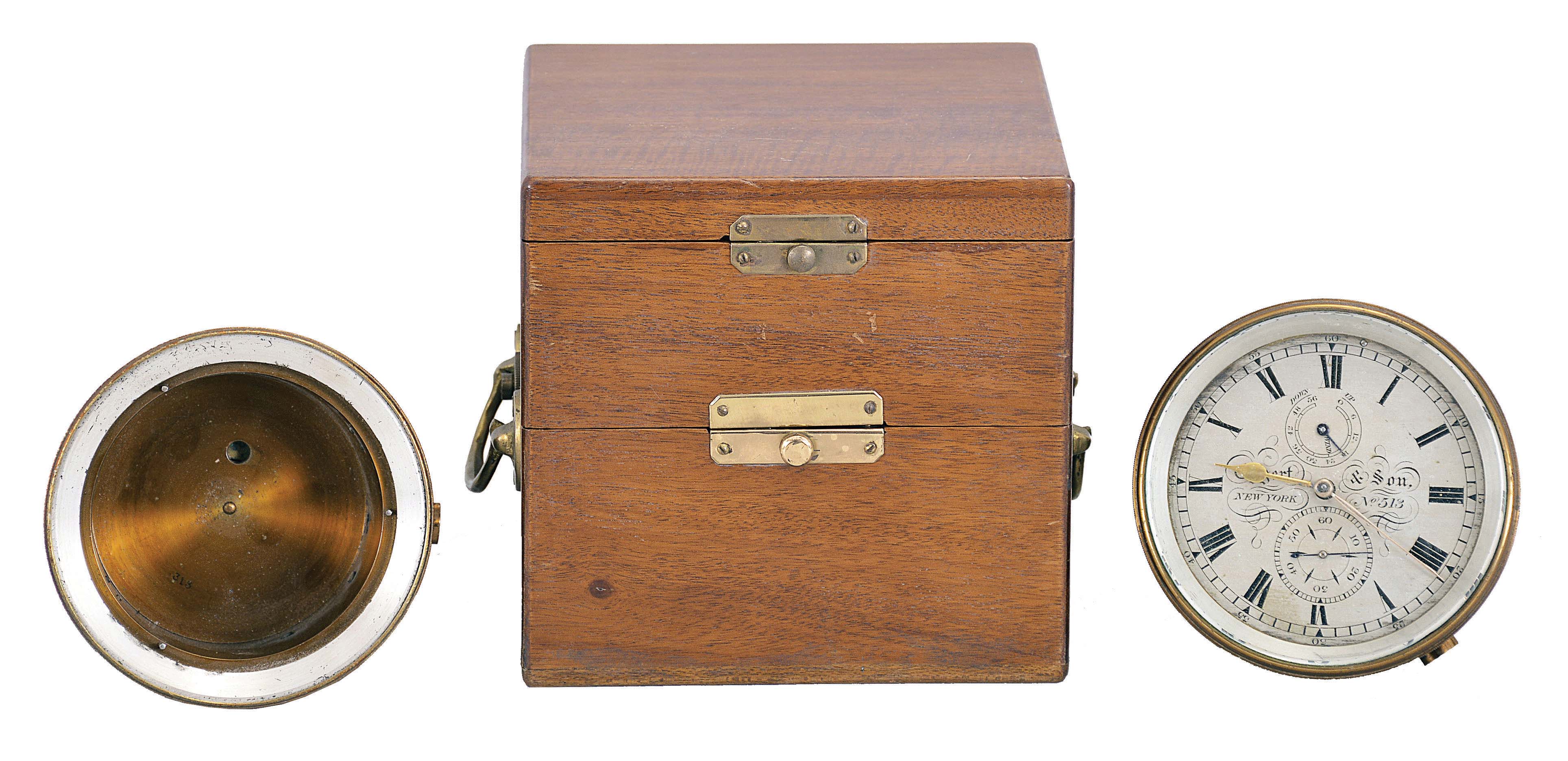 Eggert and Son, New York, a small two day marine chronometer, 10 jewel spotted movement, with bimetallic balance, helical balance spring, and adjustable gallows type stud, with inner, shock mounted dust cover in the manner of Parkinson &amp; Frodsham, roman numeral silvered dial, gold spade and poker hands, contained in a lacquered brass bowl, together with a 19th century chronometer bowl, and another gimballed bowl with later, purpose made mahogany box — Antique Clocks Price Guide