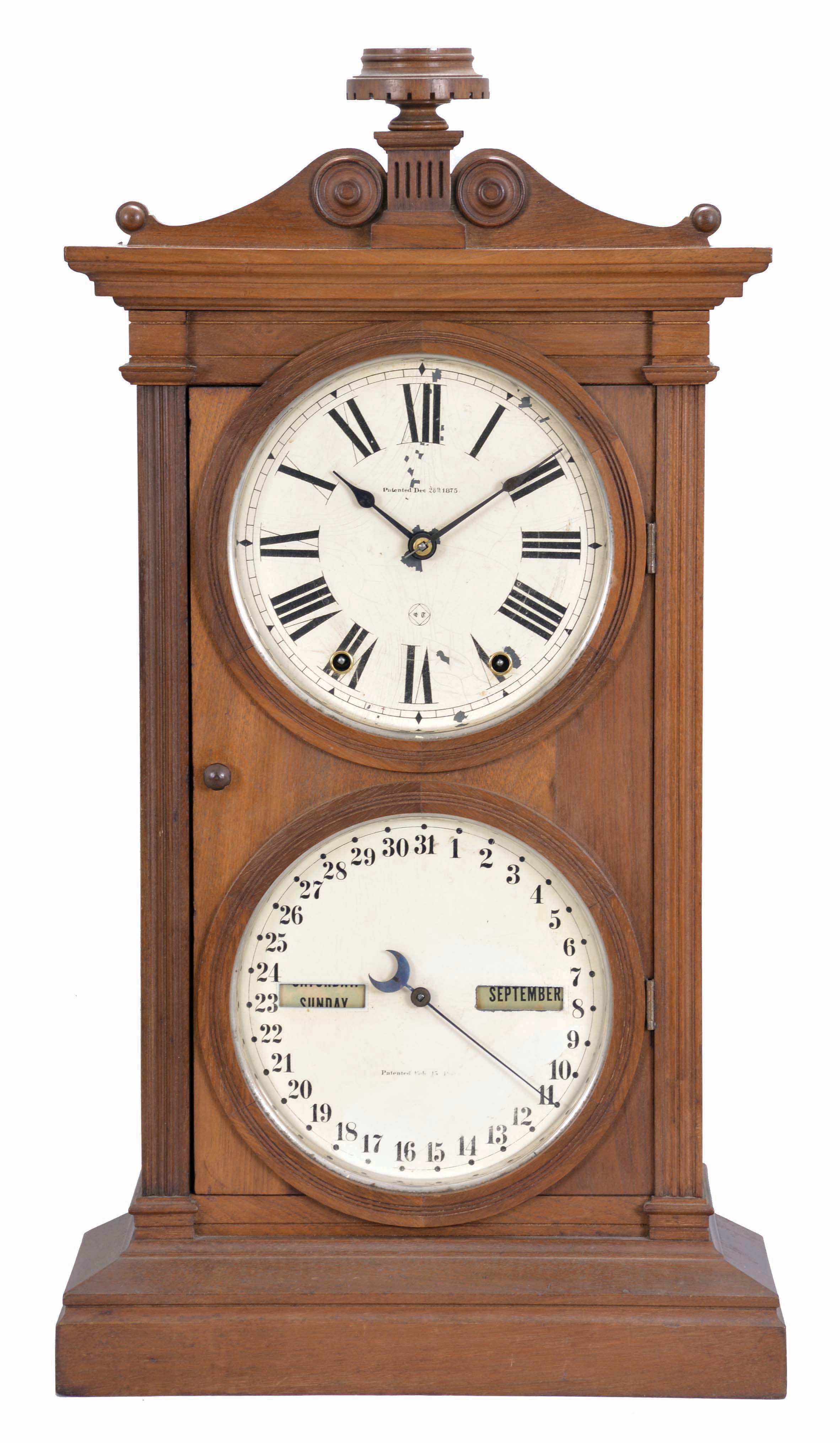 Seth Thomas Clock Co., Thomaston, Conn., "Parlor Calendar No. 6" shelf clock with a spring driven, 8 day, time and strike movement and an 1876 R. T. Andrews patent perpetual calendar mechanism in a walnut case. — Antique Clocks Price Guide