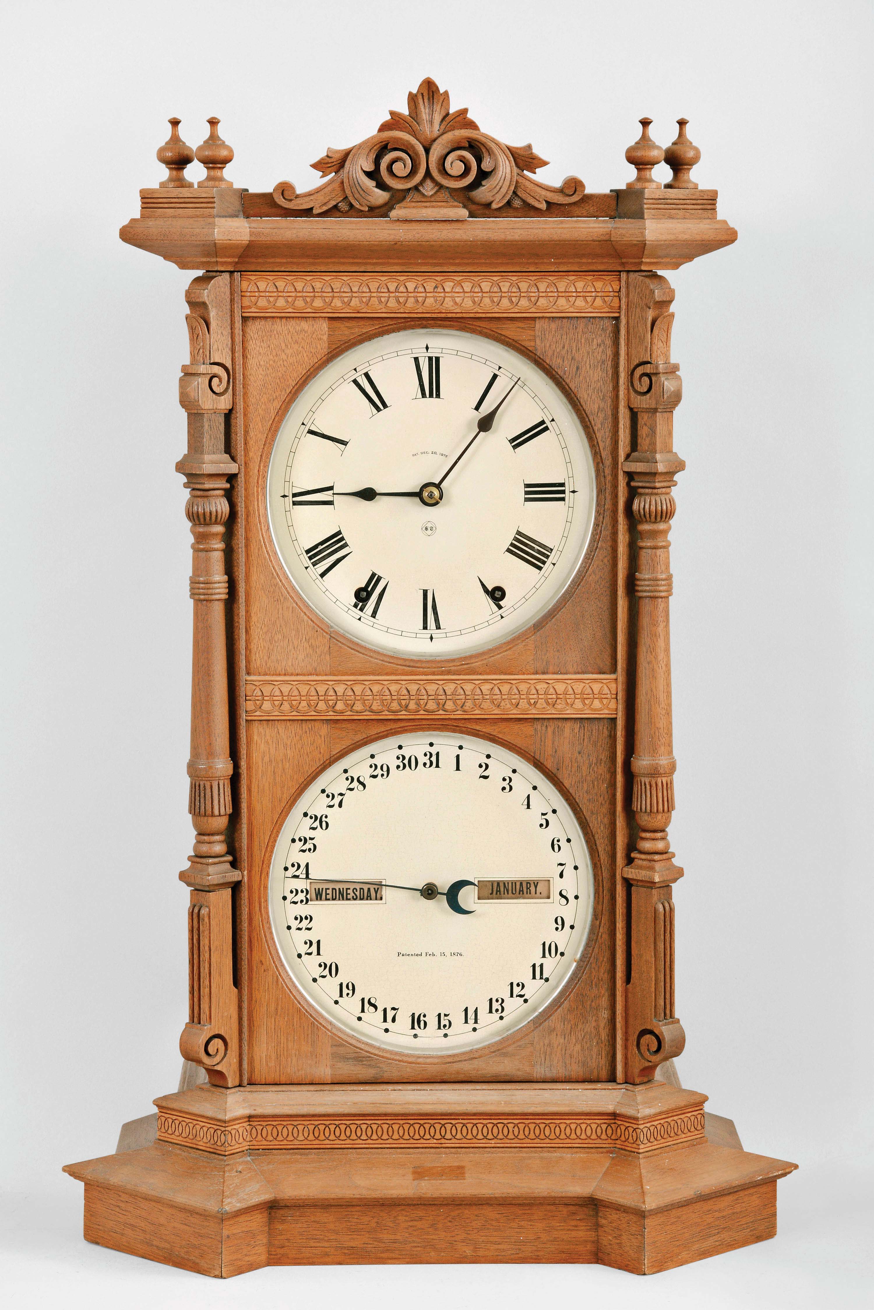 Seth Thomas Clock Co., Thomaston, Conn., "Parlor Calendar No. 8" shelf clock, 8 day, time, bell strike and perpetual calendar, spring driven movement in a walnut case with carved highlights and painted metal dials — Antique Clocks Price Guide