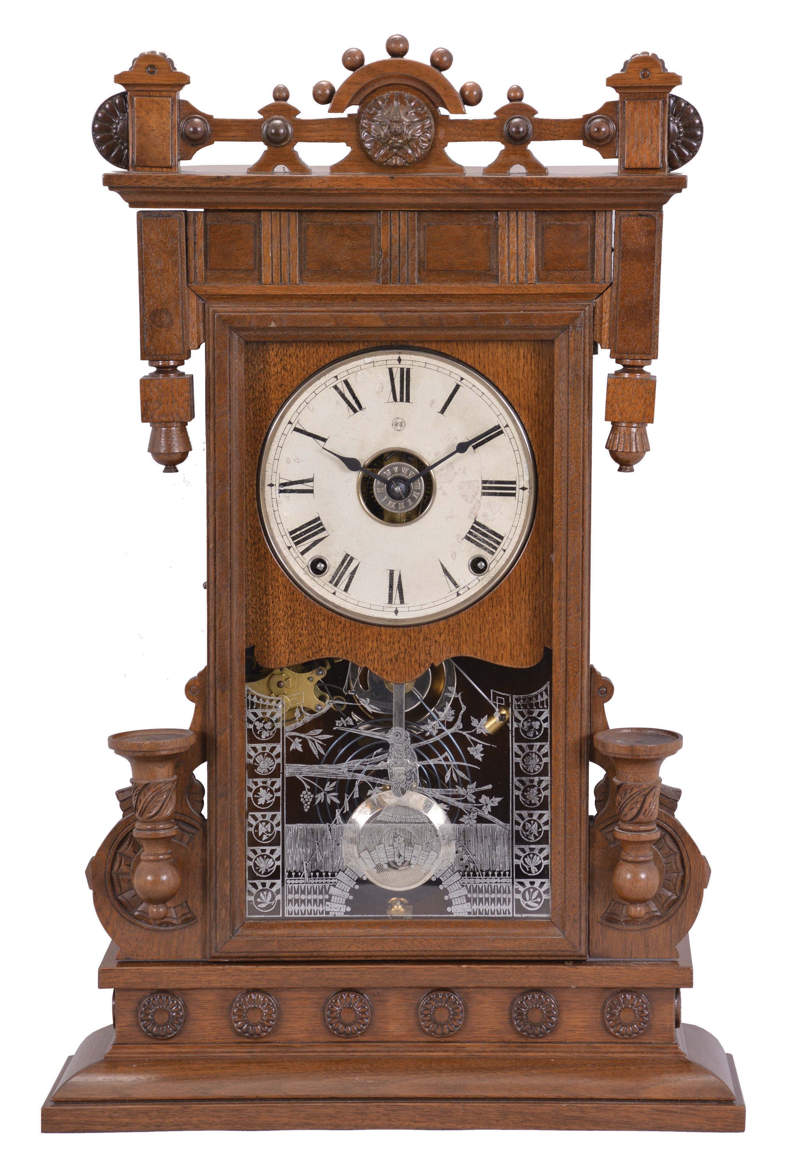 Seth Thomas Clock Co., Thomaston, Conn., "Beloit" shelf clock with a spring driven, 8 day, time, strike and alarm movement in a walnut case. — Antique Clocks Price Guide
