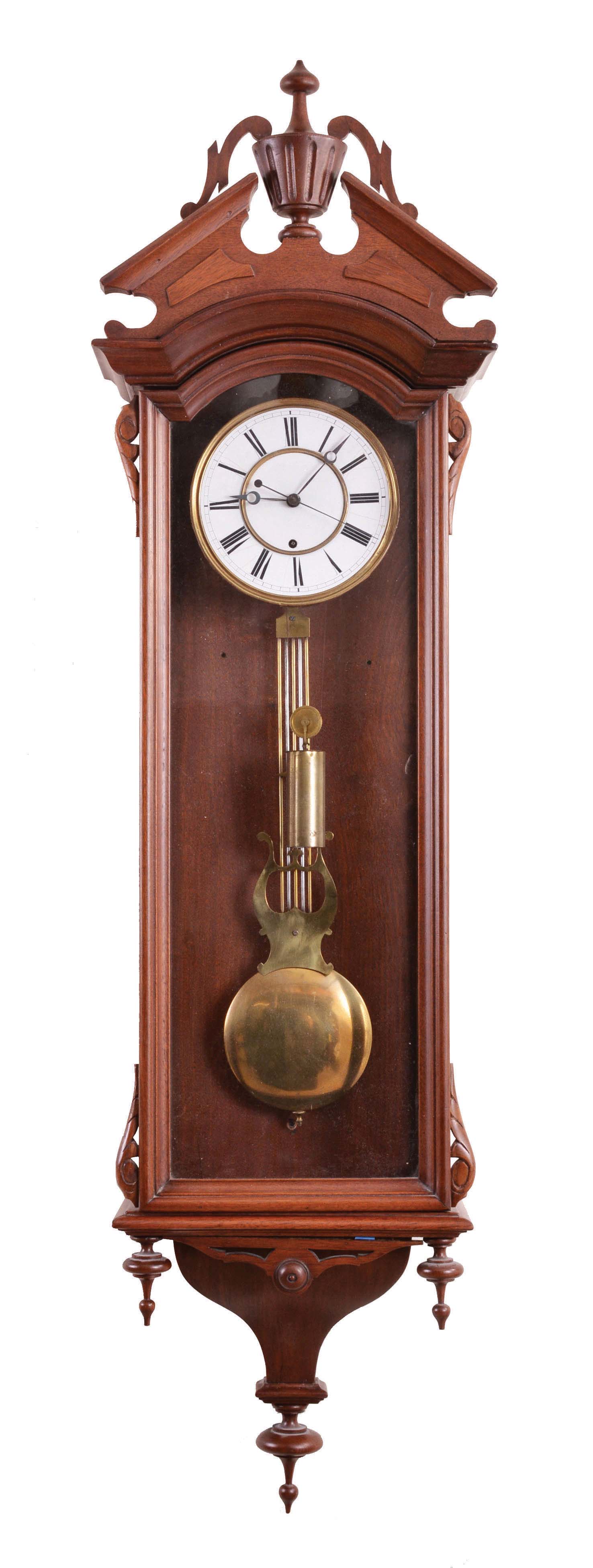 George A. Jones &amp; Co., New York, hanging regulator, 8 day, time only, brass weight driven movement with sweep center seconds in a walnut, Vienna-style regulator case with Roman numeral white enamel dial and gridiron pendulum and brass bob — Antique Clocks Price Guide